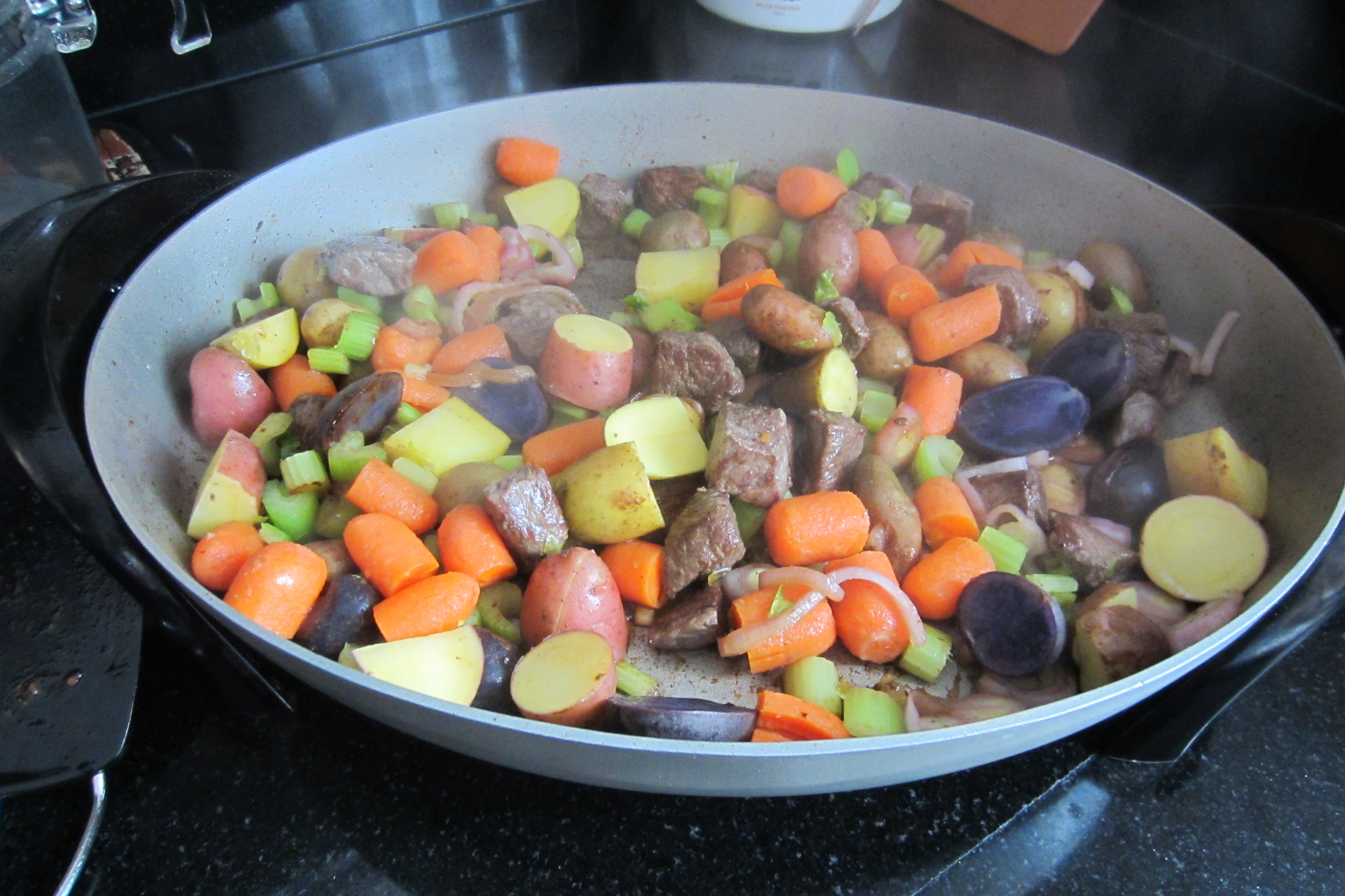 carrots, purple potatoes, onions, celery, stew meat