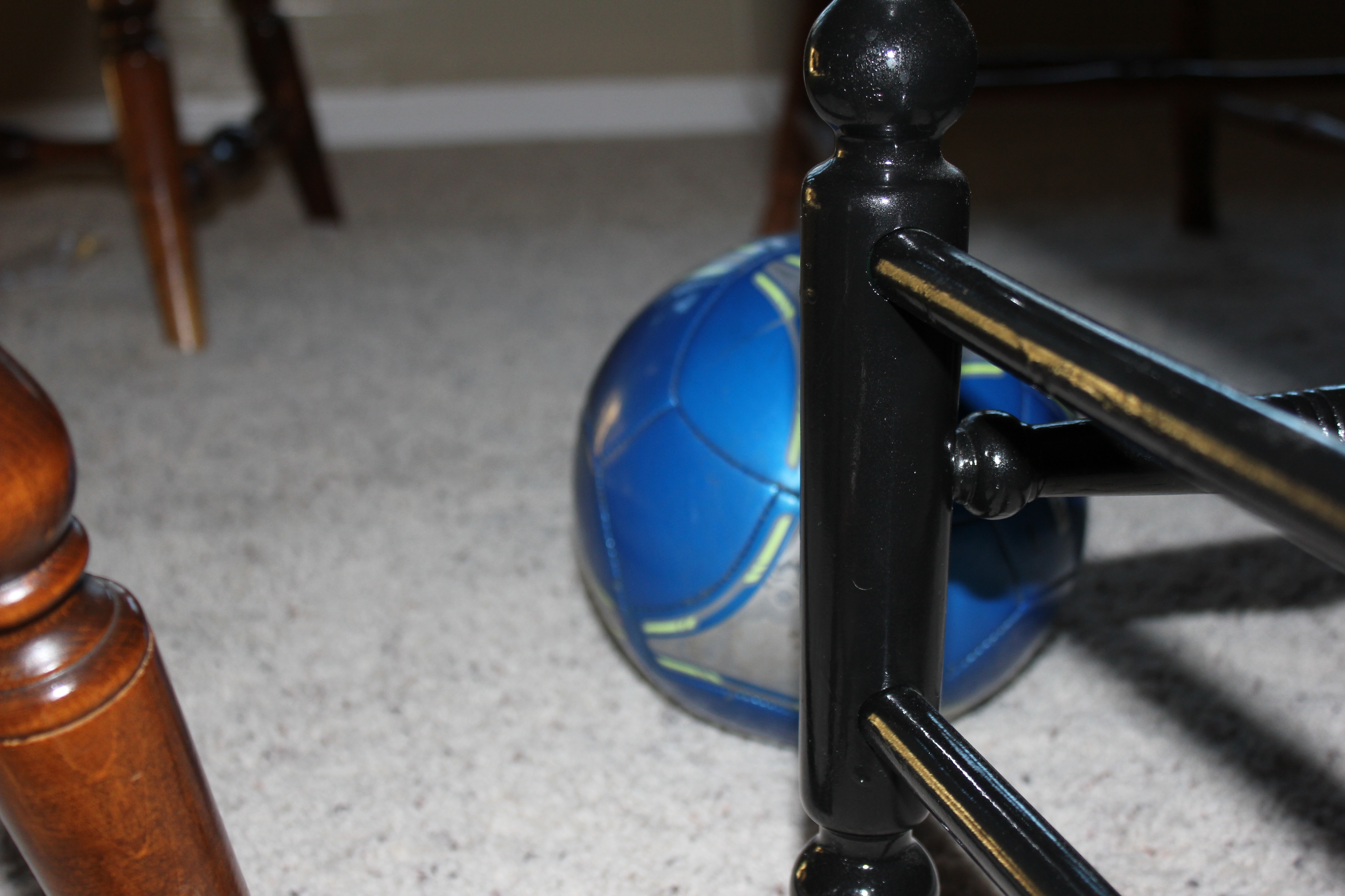 the blue soccer ball that normally lives in the dining room